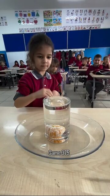 Kids in school play an interesting game