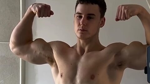 16 years old teen bodybuilder flexing muscles