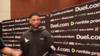 A professional boxer who raises his hands at another person for political and religious