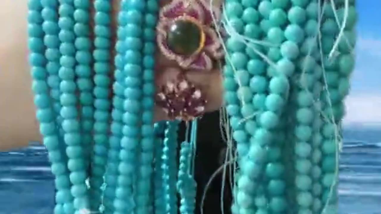 250327-12 Sourced from natural ore veins, this turquoise round bead