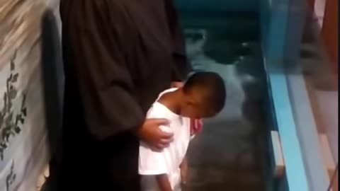 Kid Decides To Baptize Himself After Too Excited