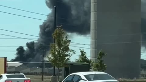 Plane crashes in Fort Worth, Texas, several vehicles on fire.