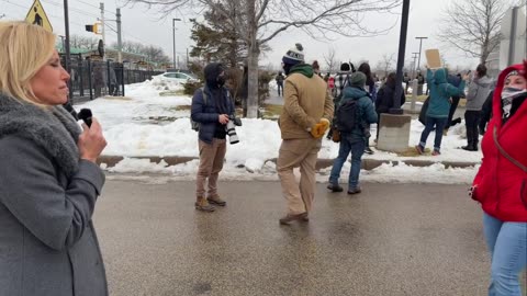 What did she say? I think she's a paid protestor