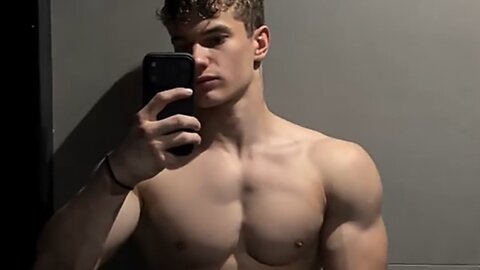 18 years old teen boy flexing muscles