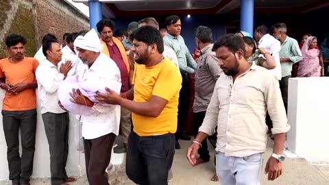 Grieving father buries son killed by toxic cough syrup in India