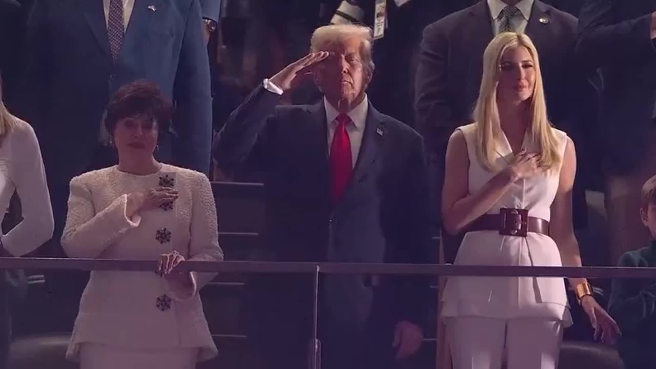 Crowd cheers as Trump is shown during the super bowl national anthem