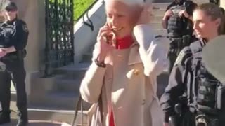 Over $12,000 in one outfit – a Gucci trench coat, Gucci handbag, and likely even a Gucci shirt.🤬