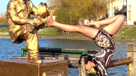 Top Levitating Goldman Statue and Most Flexible Person In The World