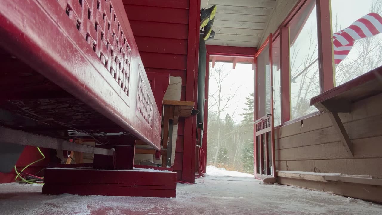 Snow maintenance on the OffGrid Porch.