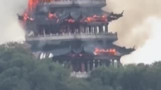 Footage shared online shows flames engulfing a pavilion at the Yongqing Temple complex in China