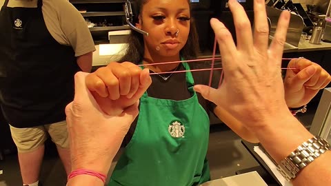 Close-Up Rubber Band Magic With the Barista