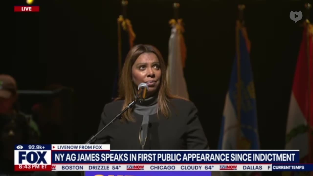 Letitia James raises her fist to the air in first public appearance since fraud indictment.