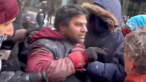 Anti-ICE Lunatics Attack a Brown Guy For Wearing American Flag Shirt