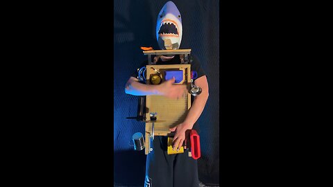 Shark man plays the doohickey