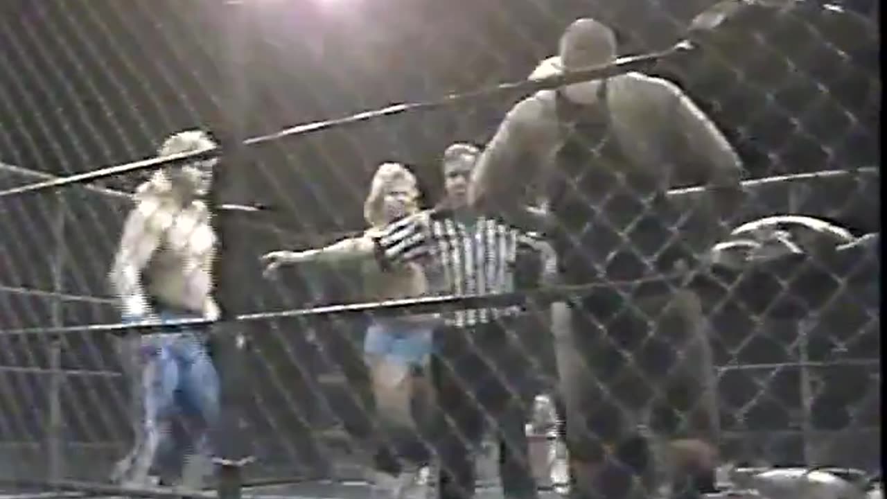 (1988.01.23) The Midnight Express vs Nikita Koloff & Dusty Rhodes - Cage Match - NWA