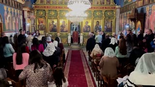 Palestinians in Gaza attend Orthodox Christmas Mass amid war