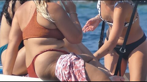 THREE BEAUTIFUL GIRLS ON A BOAT