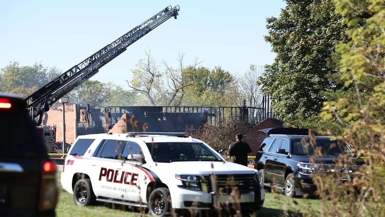 NEW: Suspected Michigan church shooter drove through door, police say