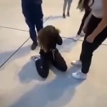 The usual suspect hits a defenseless young European woman from behind to prove he's a real man.