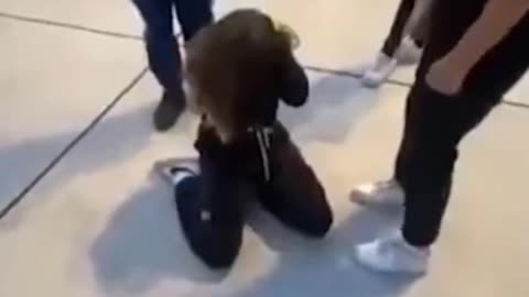 The usual suspect hits a defenseless young European woman from behind to prove he's a real man.