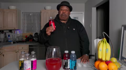Mixing Every Vitamin Water in One Huge Glass and Chugging It