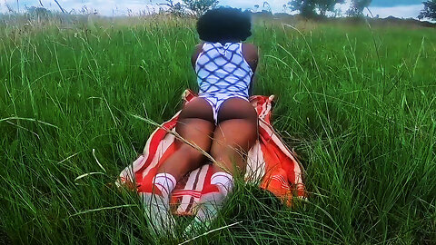African Zulu Woman Does Outdoor Yoga