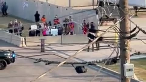 DHS set up a sniper nest at the ICE Chicago facility, overlooking leftist rioters and Antifa.