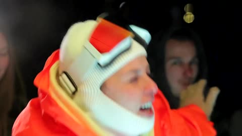 Families party outdoors as Russian strikes cut power in Kyiv