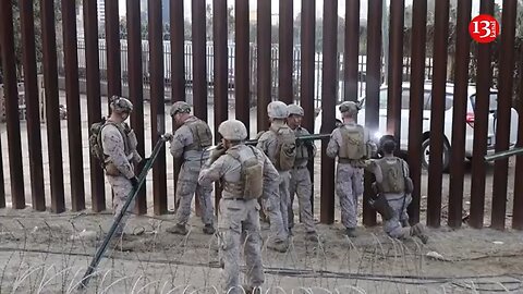 US military install concrete wire on south border wall in California