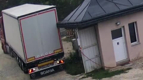 Truck Driver Hits Roof of Storage Space