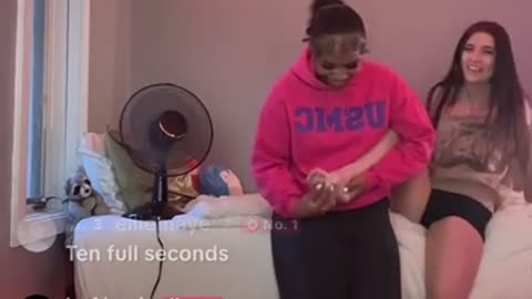 Black girl tickling friends feet
