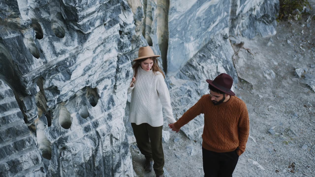Couple Holding Hands While Walking, Loving Moment