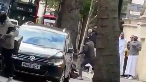 Open, armed gang violence outside regents park mosque in broad daylight.