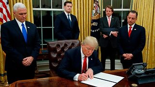 U.S. President Donald Trump signs Executive Orders in the Oval Office