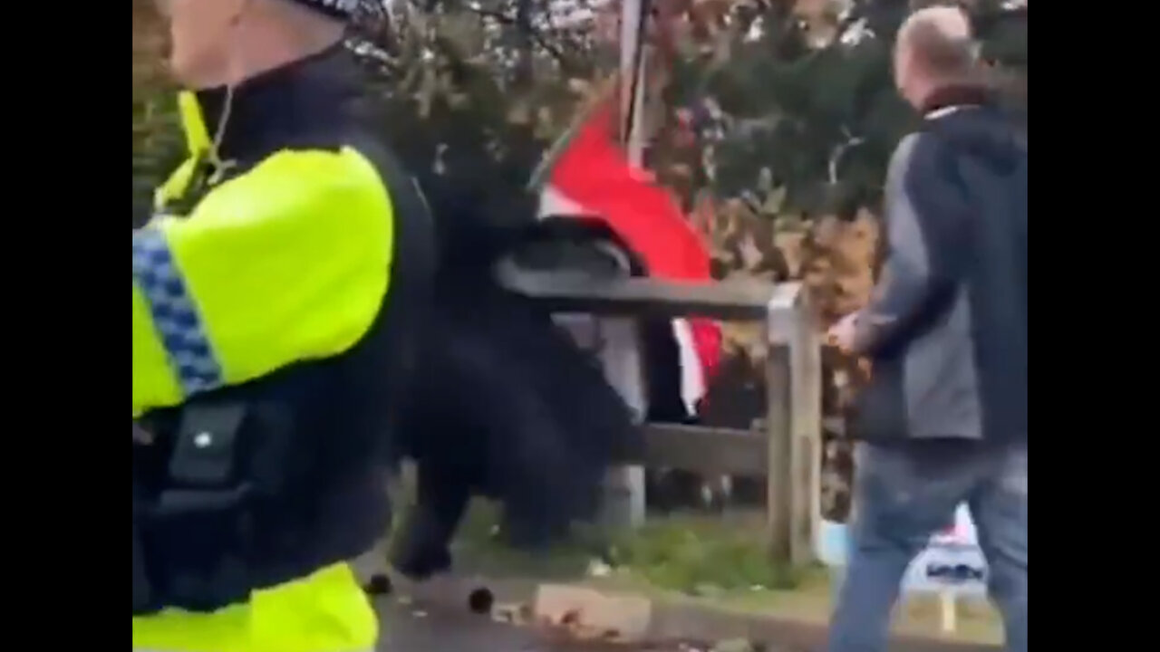 WATCH - "TRANSGENDERISM" I CAN SUPPORT: MAN IN BURKA STEALS Palestinian flag from pro-Hamas rally