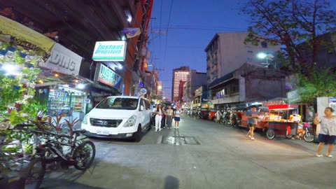 Coeds Strolling Along P. Campa Street in Manila City in the Philippines