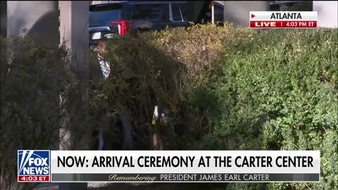 Former President Jimmy Carter’s motorcade arrives at Carter Center