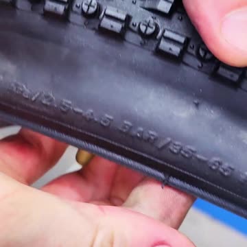 Quick installation of a bicycle tube into a wheel