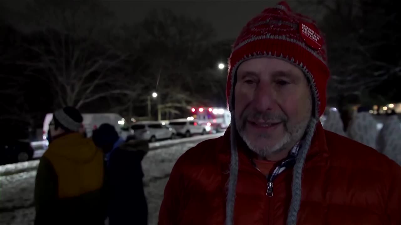 Residents hold vigil for victims of Brown University shooting
