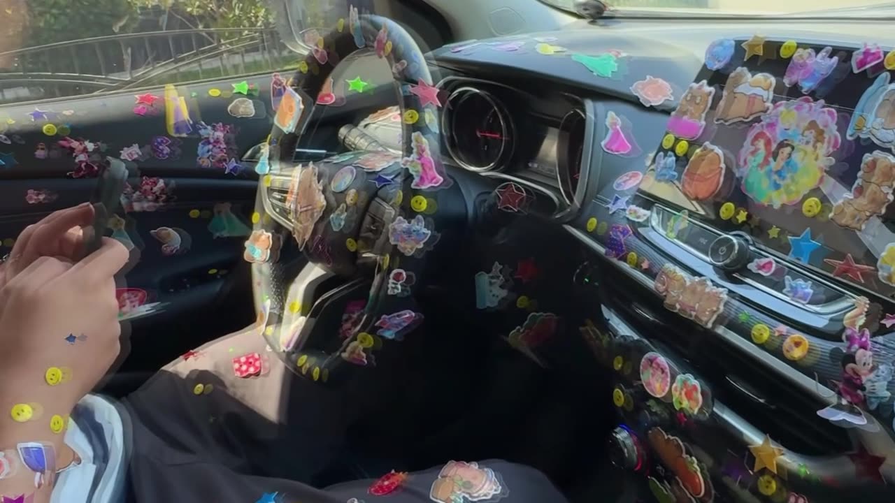 Girl Puts Stickers Everywhere