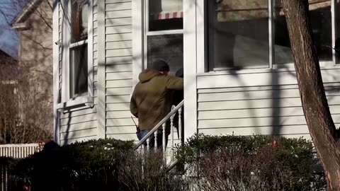 Police go door-to-door as Brown University manhunt intensifies