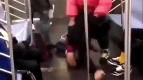 Dude Gets Pantsed & Beaten Up On A Train By A Giant Fat Lady