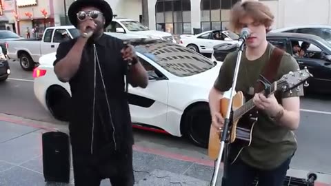 will.i.am surprises street performer