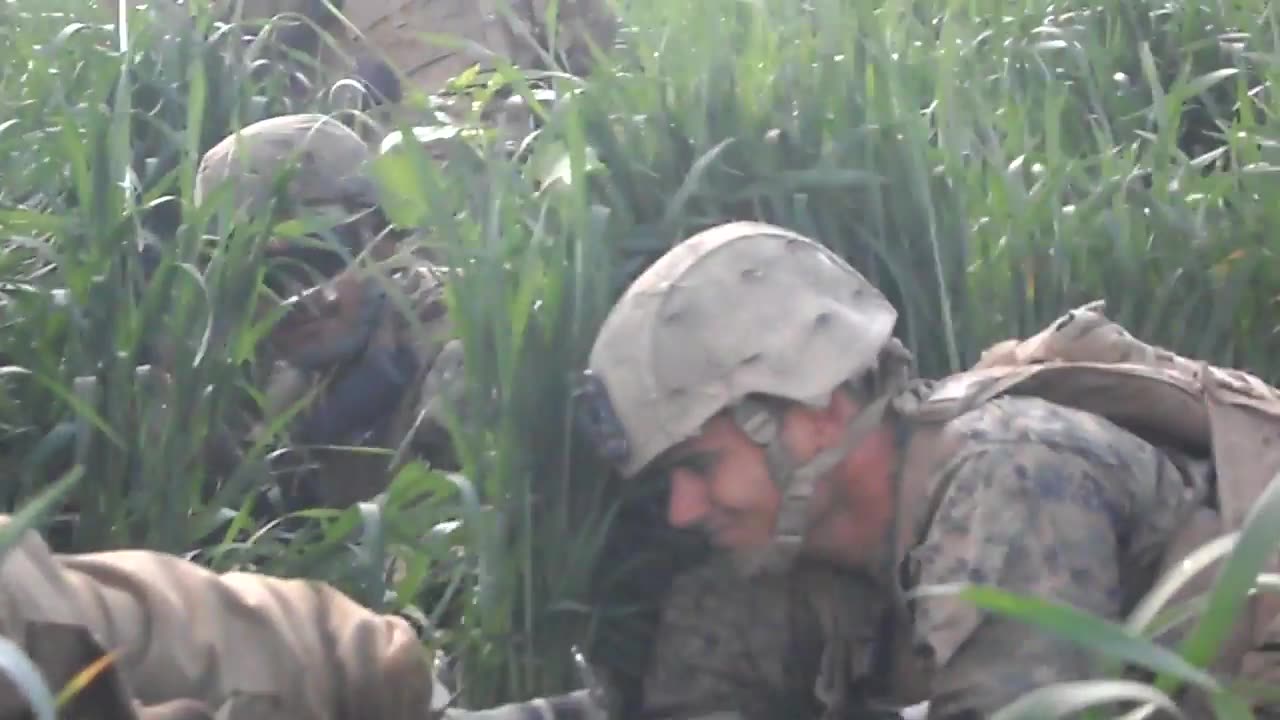 U.S. MARINES FIREFIGHT WITH TALIBAN IN TALL GRASS
