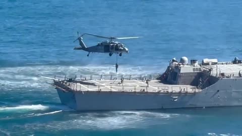 The Navy Seals perform a fast rope Demonstration for First Lady Melania Trump 