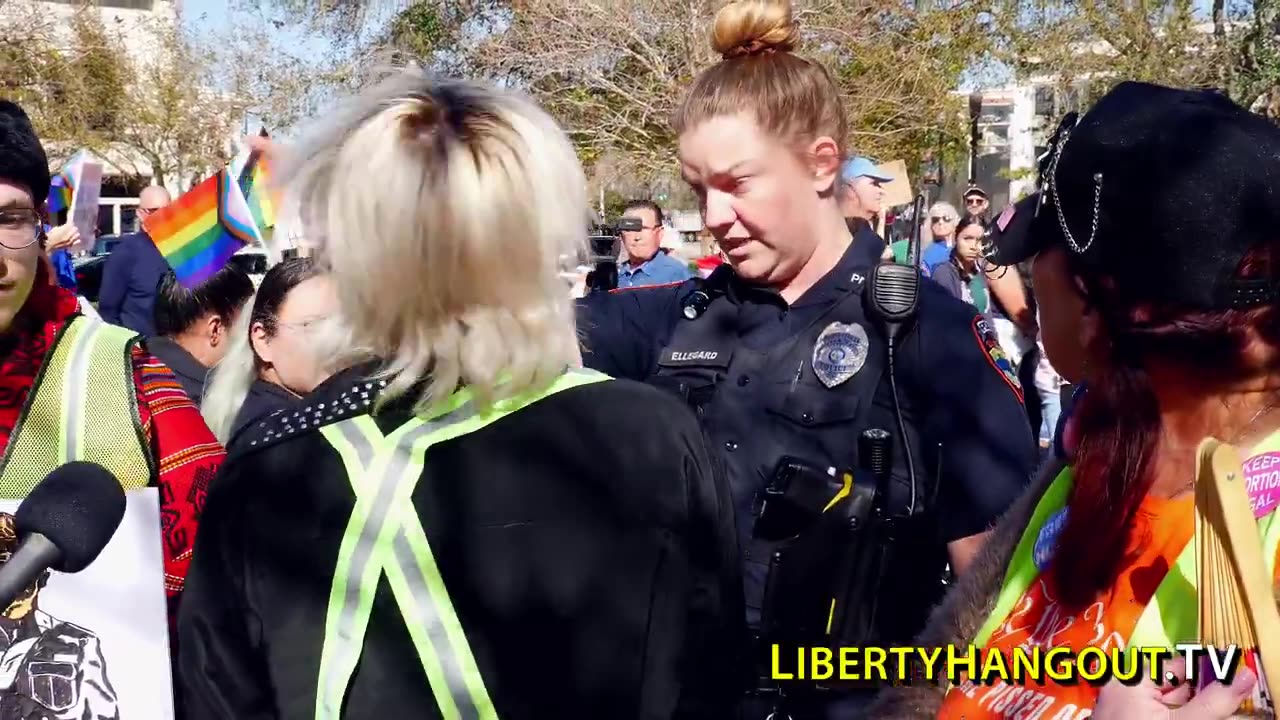 Police step in to protect reporter Kaitlin Bennet from anti Trump protestors. the hate is real.