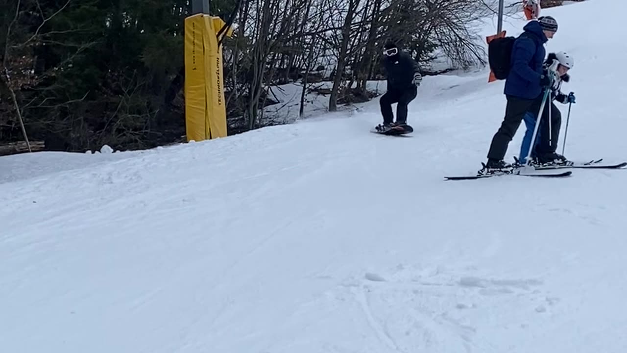 Snowboarder Gets an Unintended Strike