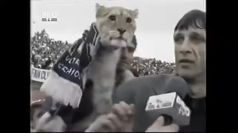 The coach Emil Sandoi with Universitatea Craiova's mascot _The Lion_