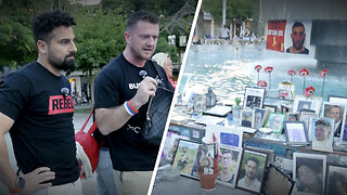 Tommy Robinson's first stop in Israel: memorial honouring those killed by Hamas