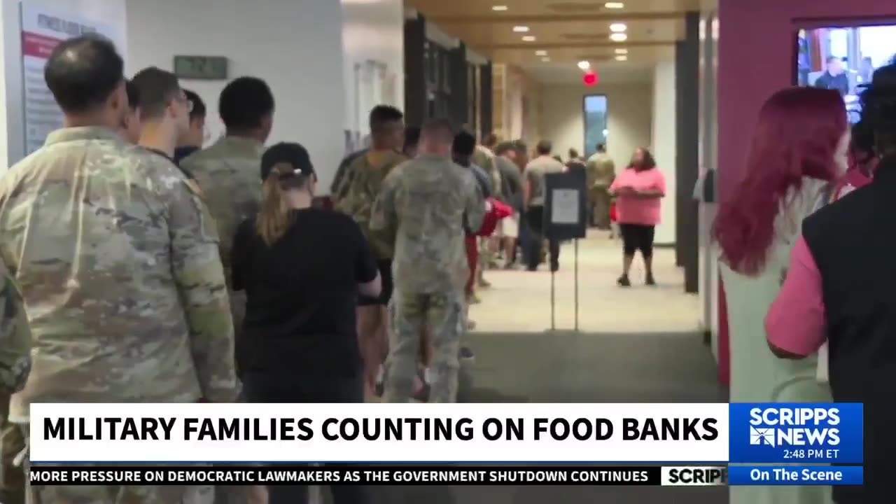 The line at this food bank is filled with military families who have no idea when theyll
